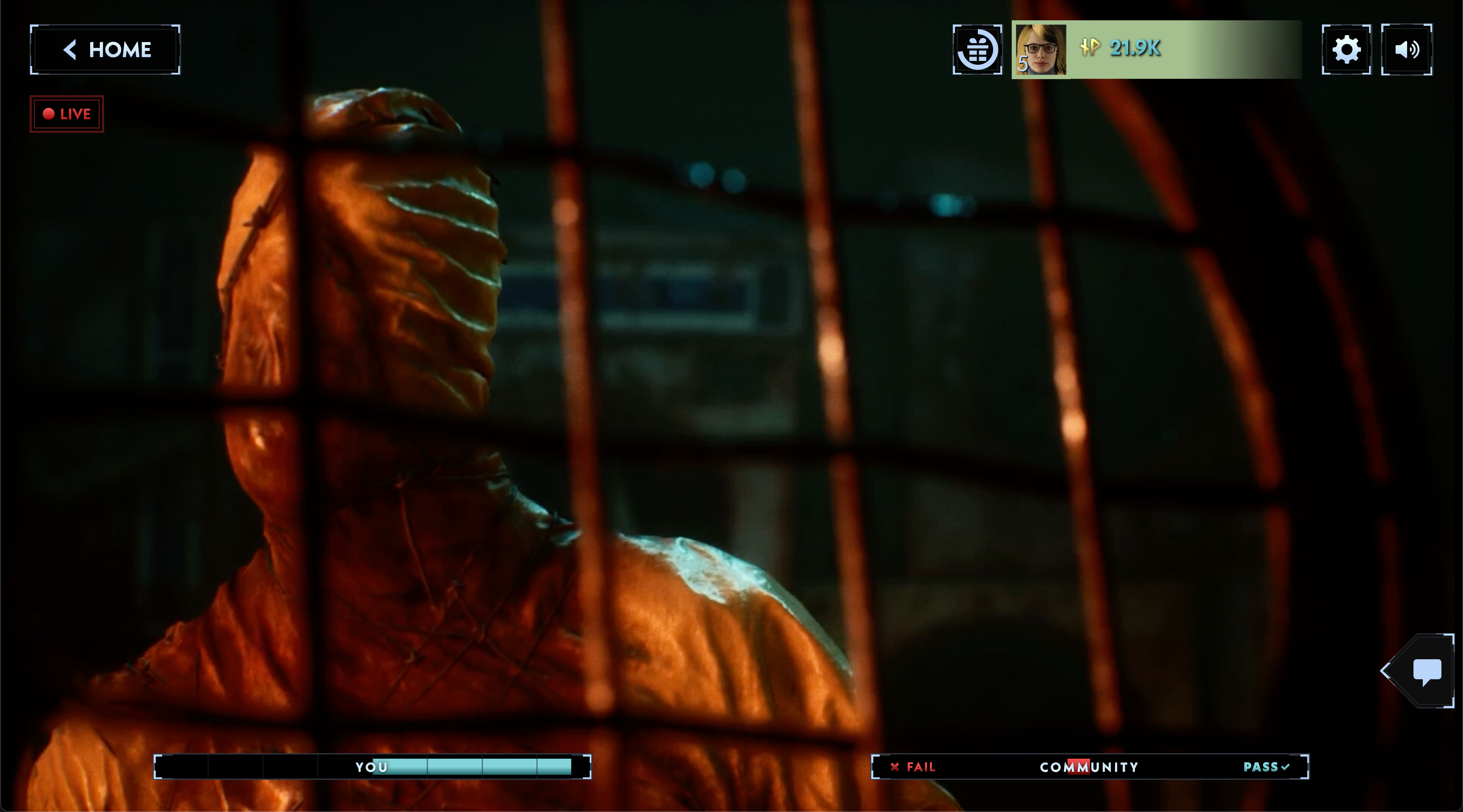 A humanoid face is encased in a skin-like shroud, covered in barbed wire behind a steel fence.