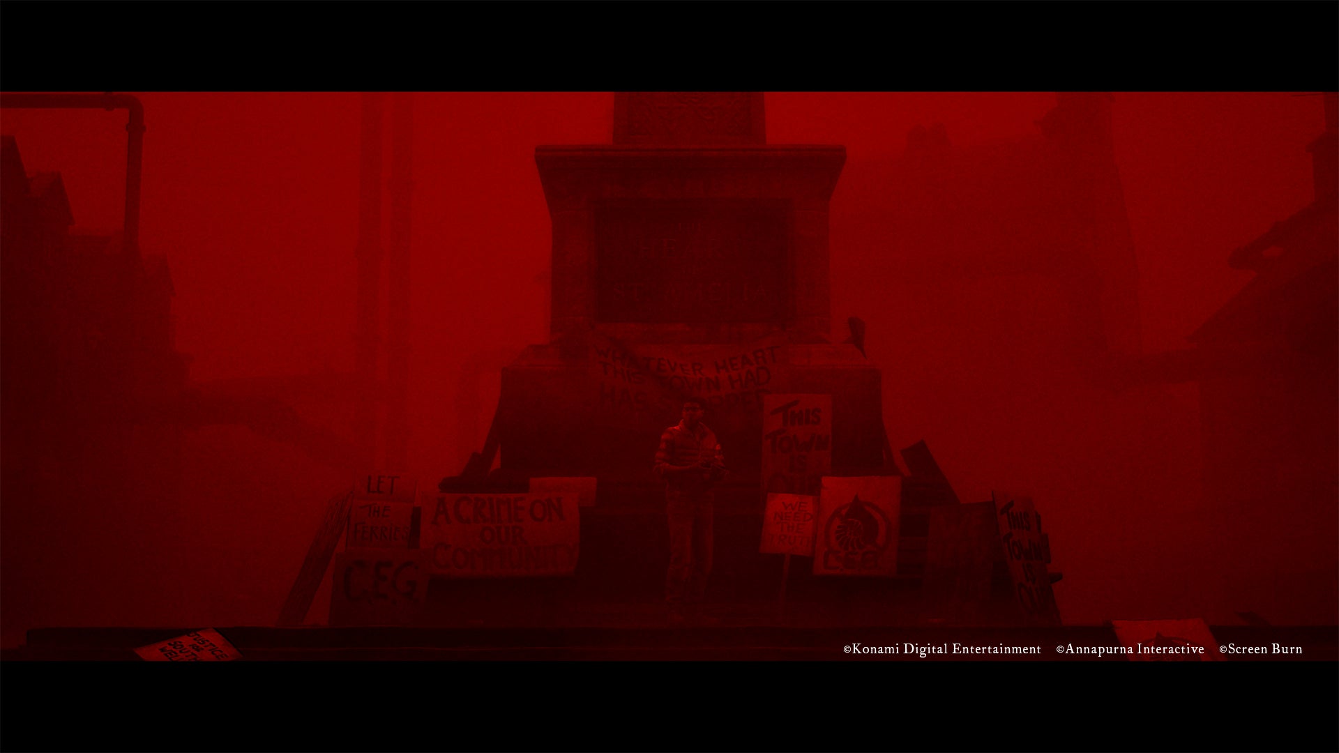 A red-tinted town square featuring a stone monument covered in protest signs reading phrases like "This town is..." and "A crime on our community," with a lone figure standing before it.
