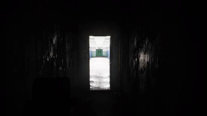 Silent Hill The Short Message Screenshot. You stare down a darkened corridor. At the end, another bright, clean corridor awaits, its green doors beckoning.