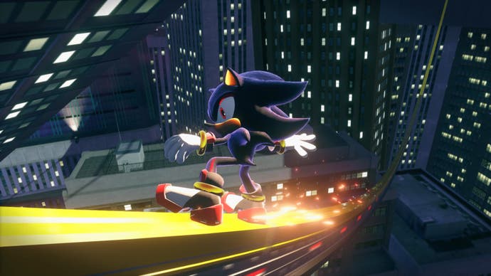Shadow the black hedgehog grinds on a rail in a nighttime city