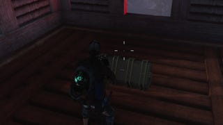 The player looks at an opened weapon crate in Brookham in Once Human
