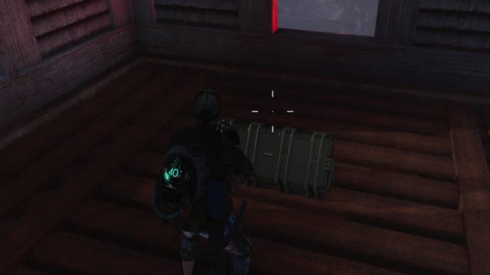 The player looks at an opened weapon crate in Brookham in Once Human