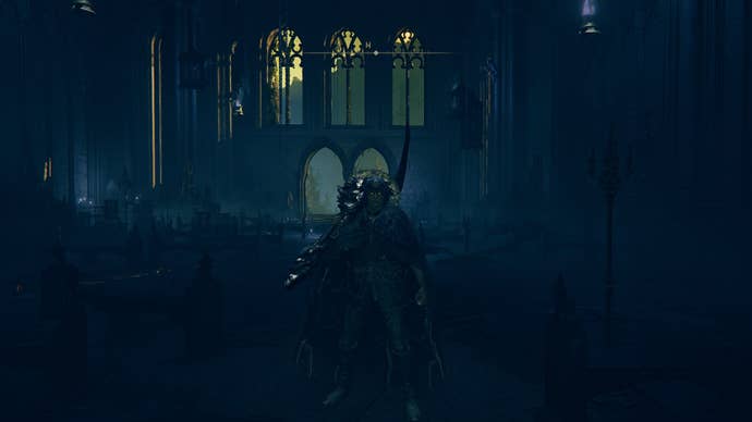 The Tarnished stands inside the Cathedral of Manus Metyr in Elden Ring Shadow of the Erdtree