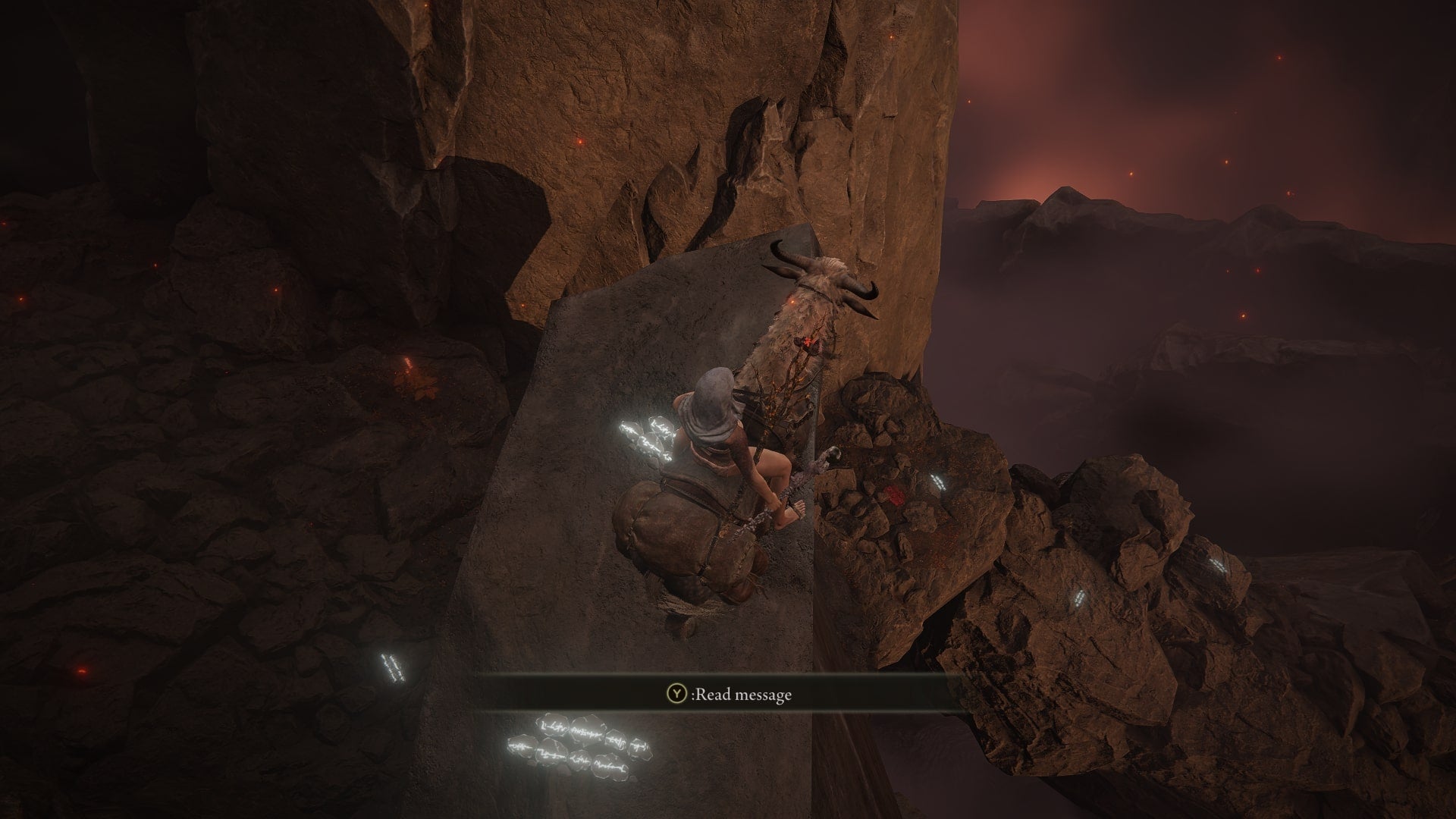 The Tarnished stands in Jagged Peak looking down at where a painting solution can be found in Elden Ring Shadow of the Erdtree - 8