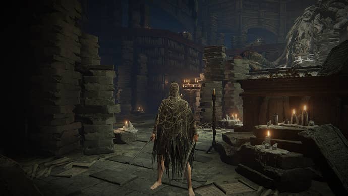 The Tarnished stands in Specimen Storehouse while wearing Hornsent’s armor and wielding the Falx in Elden Ring Shadow of the Erdtree