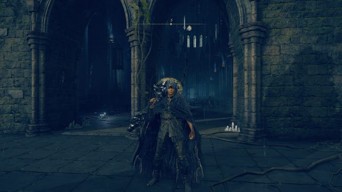 The Tarnished stands in front of the Cathedral of Manus Metyr in Elden Ring Shadow of the Erdtree