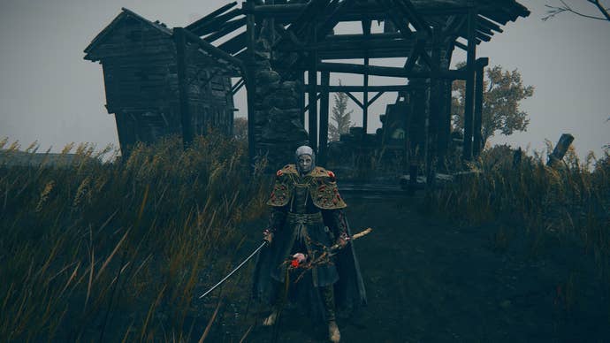 The Tarnished stands in front of the Artist’s Shack in Gravesite Plain of Elden Ring Shadow of the Erdtree