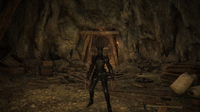 The Tarnished stands inside Taylew's Ruined Forge wielding Smithscript Cirques in Elden Ring Shadow of the Erdtree