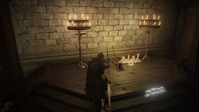 The Tarnished faces a lever found on the seventh floor of the Specimen Storehouse in Elden Ring Shadow of the Erdtree