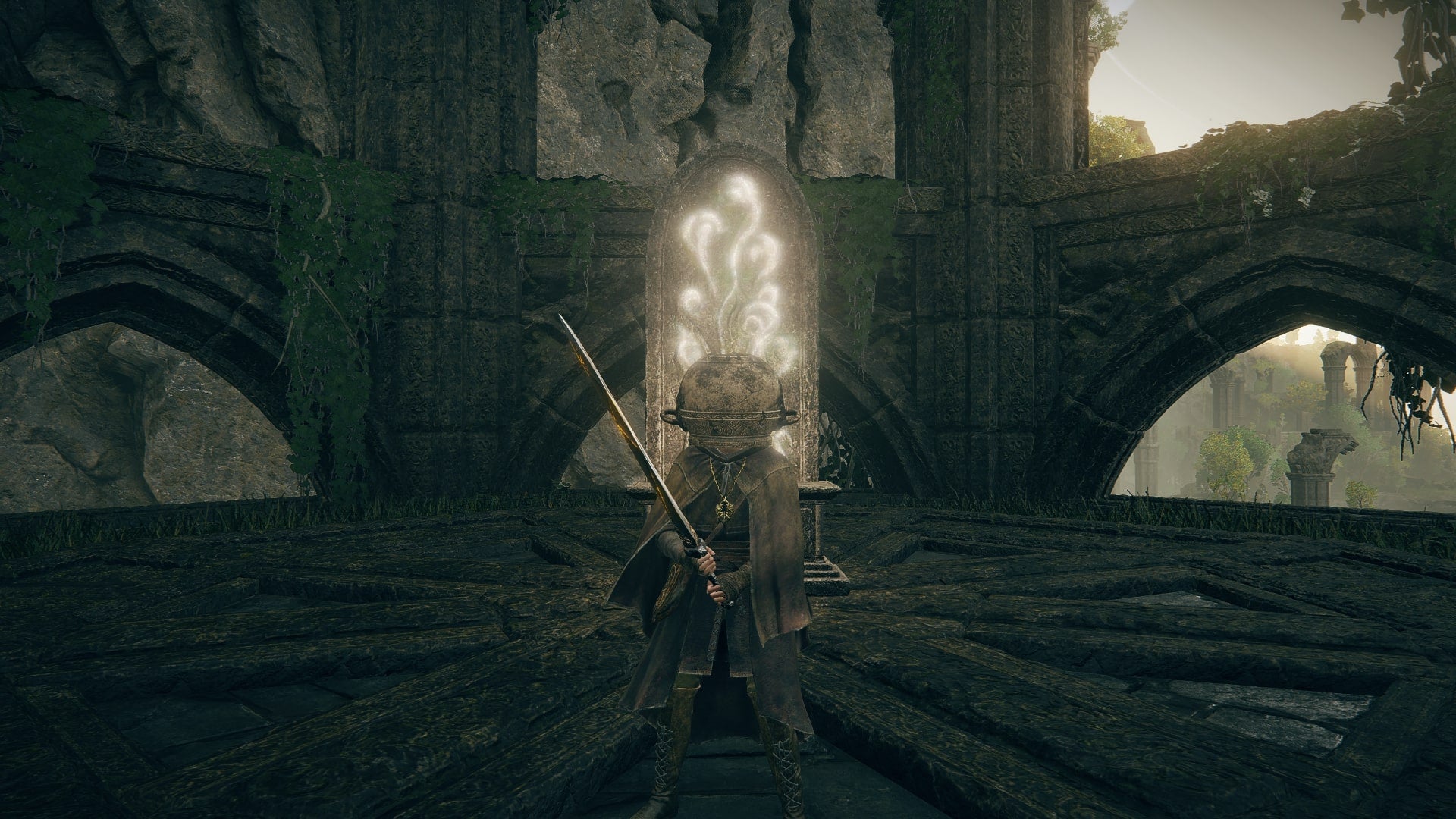 The Tarnished stands in front of an altar in Ancient Ruins of Rauh while holding the Sword of Light in Elden Ring Shadow of the Erdtree - 1