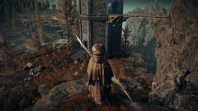 The Tarnished faces a tower to the east of Castle Ensis in Elden Ring Shadow of the Erdtree