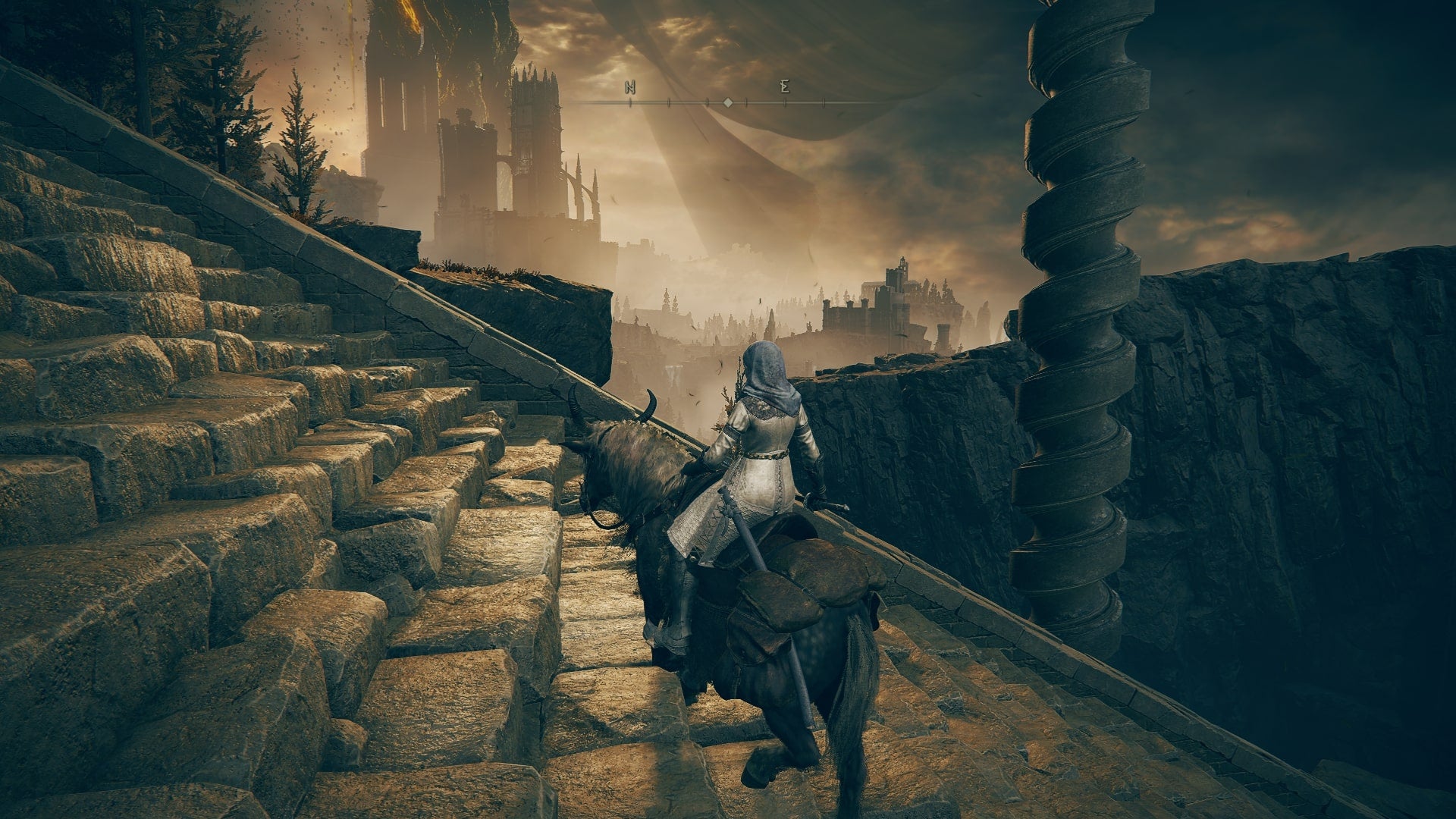 The Tarnished, atop Torrent, waits on some stairs in Belurat Tower Settlement in Elden Ring Shadow of the Erdtree - 1