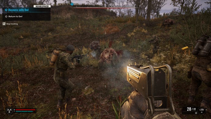 Dog-like mutants attack a band of stalkers in S.T.A.L.K.E.R. 2: Heart of Chornobyl.