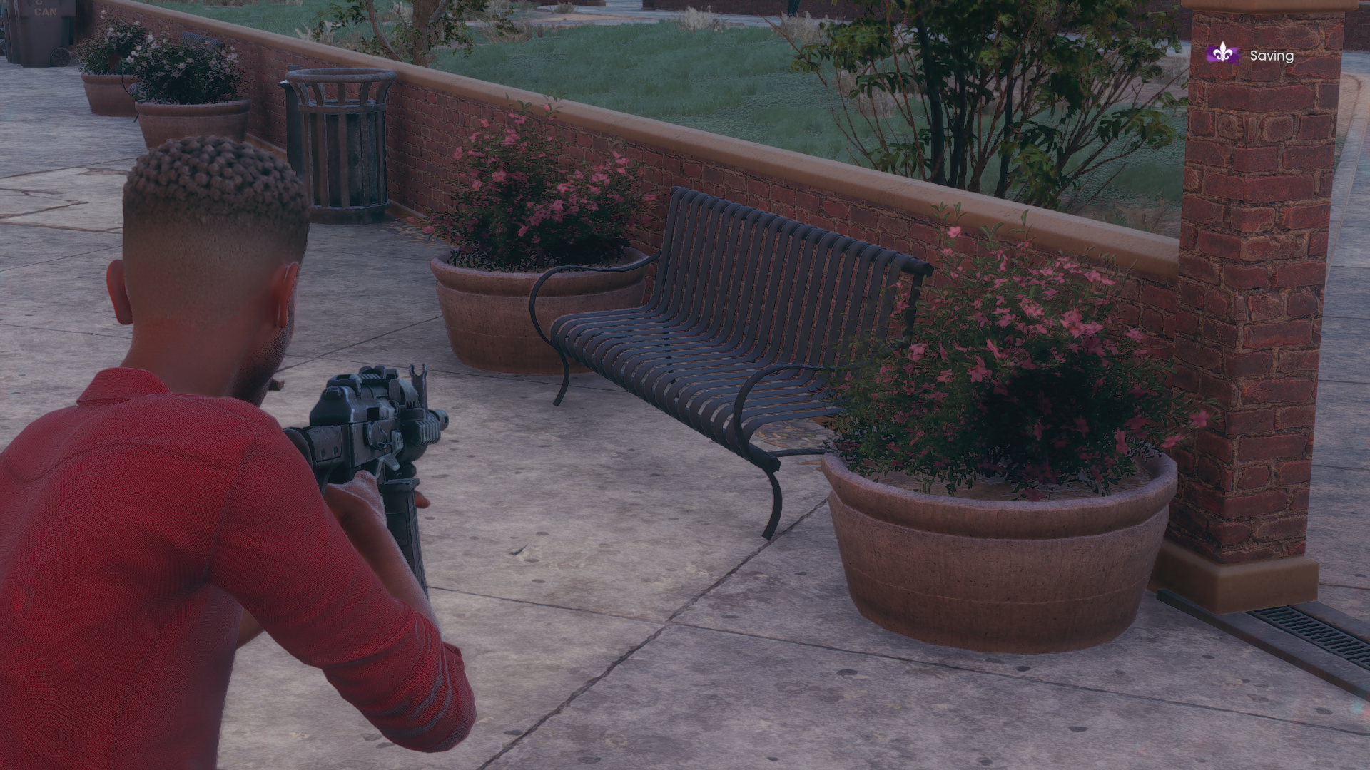 A bench and some planters showing ray traced ambient occlusion, on its High setting, in Saints Row.