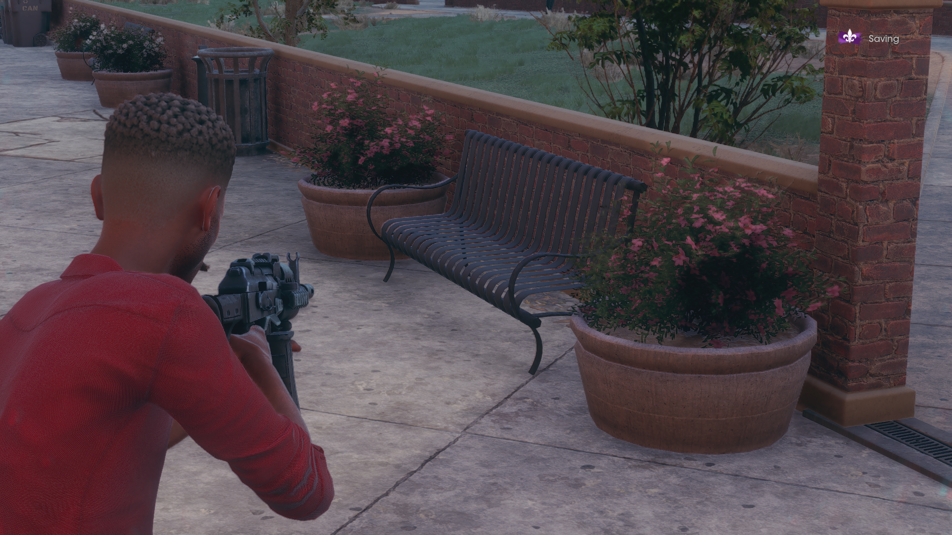 A bench and some planters showing ray traced ambient occlusion, on its Medium setting, in Saints Row.