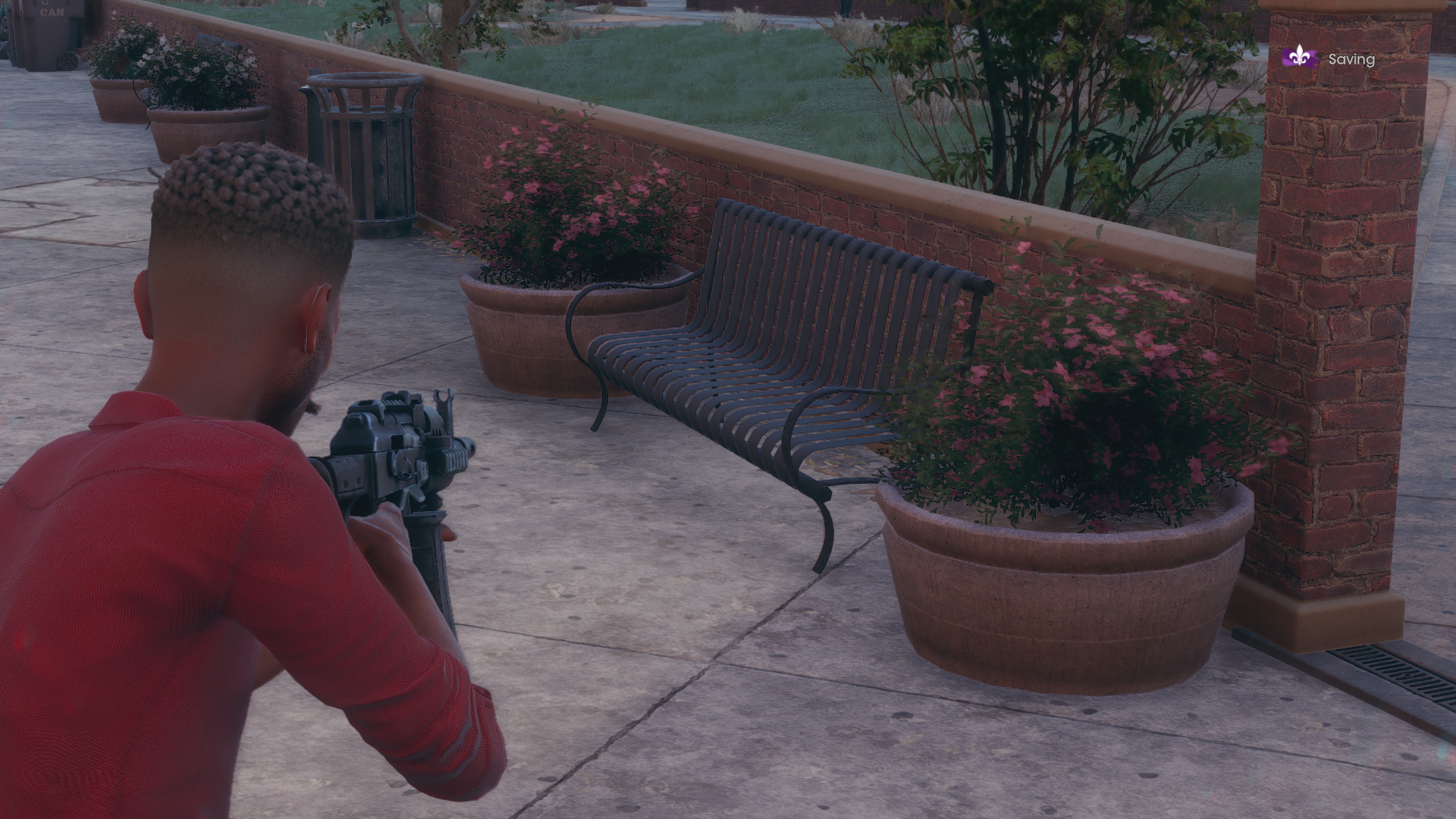 A bench and some planters showing ray traced ambient occlusion, on its Ultra setting, in Saints Row.