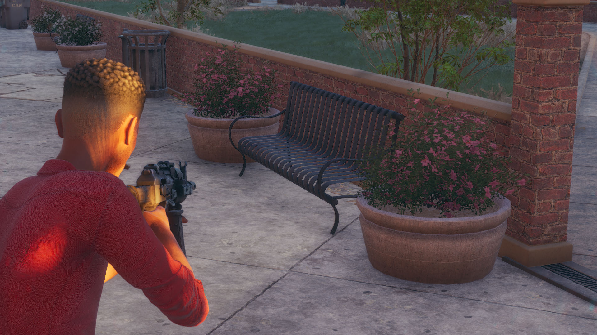 A bench and some planters showing ambient occlusion, without ray tracing, in Saints Row.