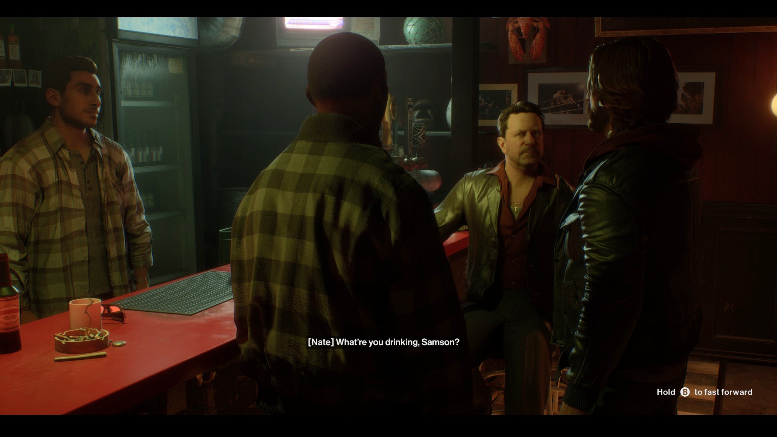 Samson talking to his mates in a bar in Samson.