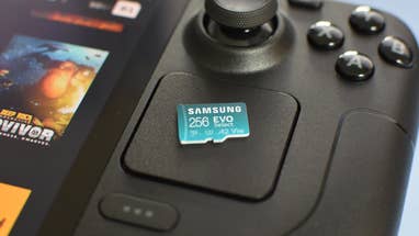 A Samsung Evo Select microSD card sitting on top of a Steam Deck.