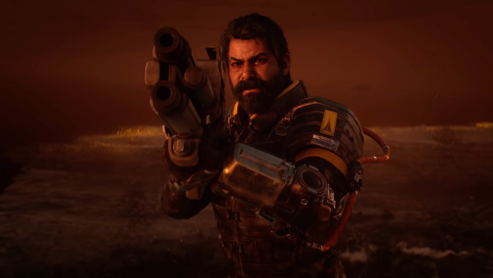 Saros trailer screenshot showing man in sci-fi suit aiming a gun on alien planet