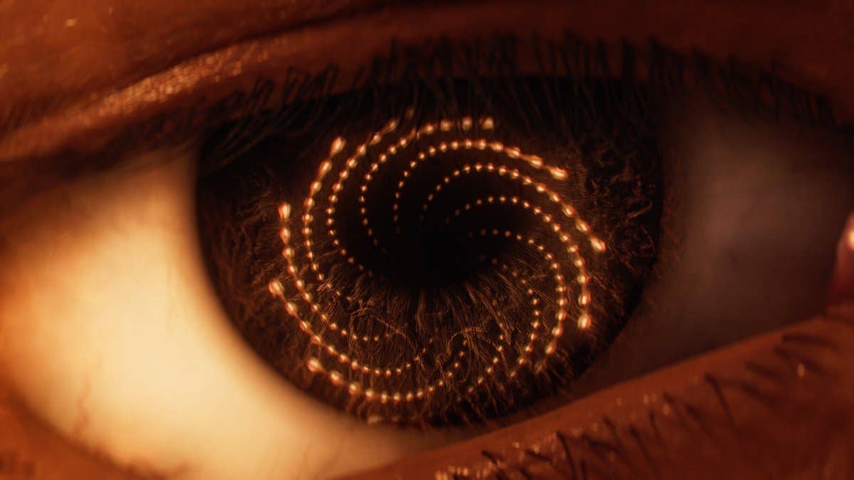 Saros trailer screenshot showing a swirl of bullets reflected in an eye