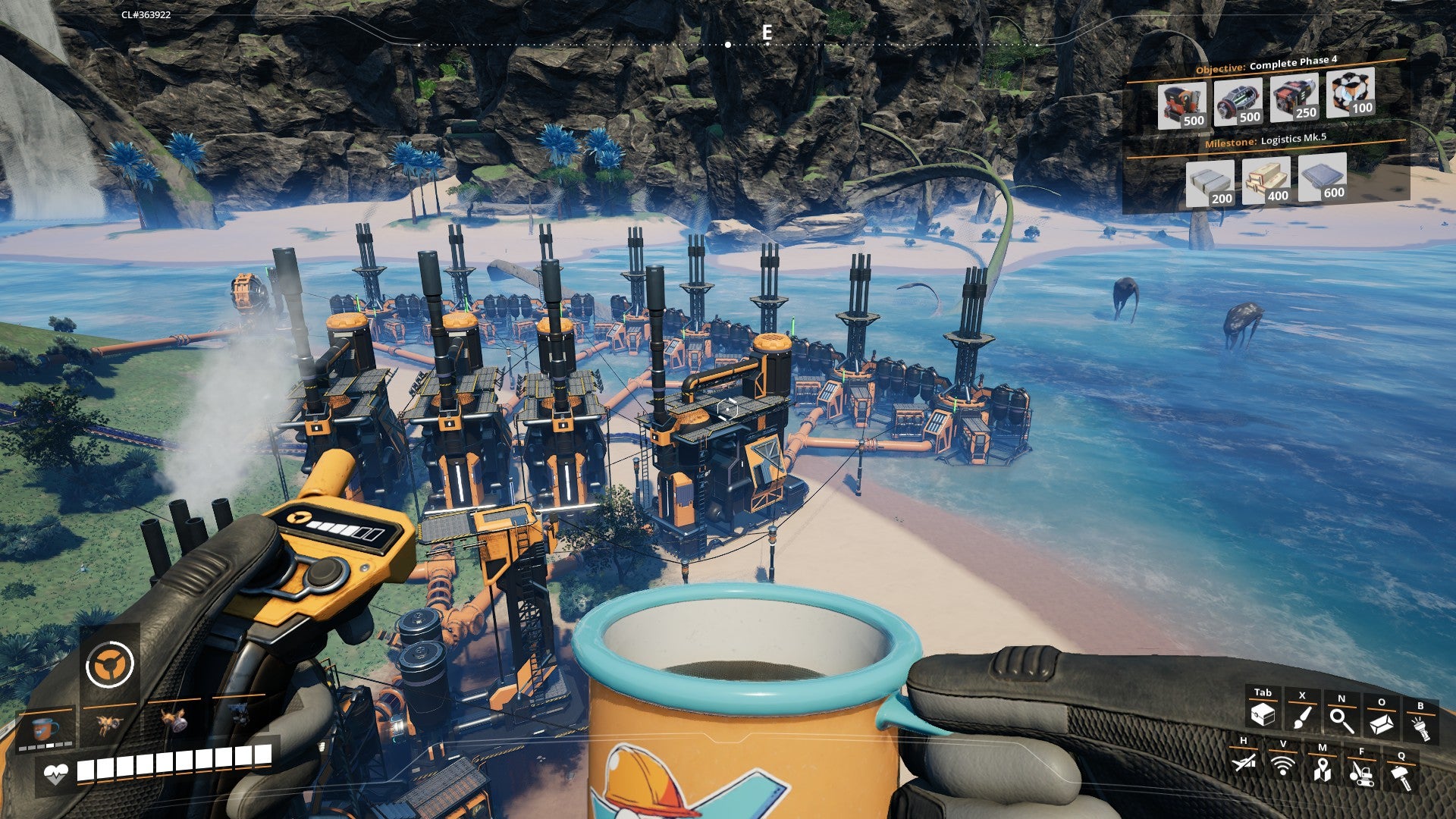 Doing some seaside factory building with a mug of coffee in one hand, in a screenshot from Satisfactory. - 1