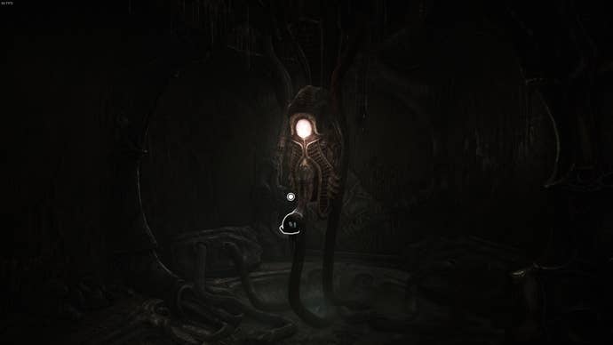 A rather phallic looking pillar that the player must put their arm inside in Scorn's Act 1 can be seen