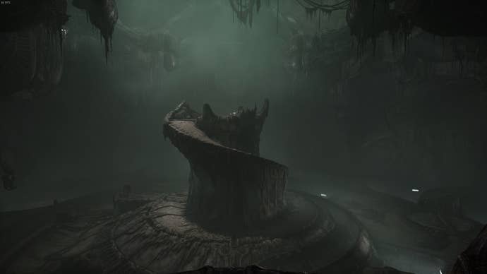 A tall landmark with a path spiralling around it can be seen in Scorn's Act 1