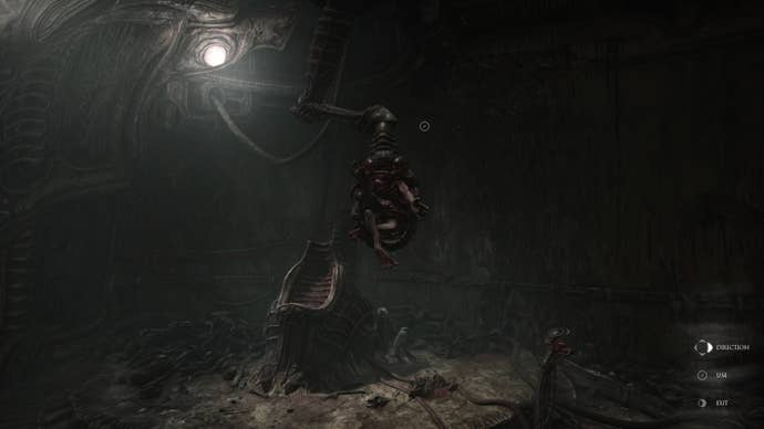 A creature is picked up by a claw-like machine in Scorn's Act 1