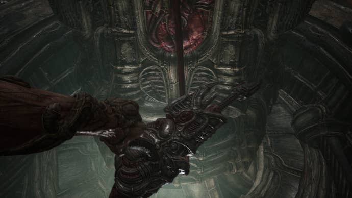 A player retrieves their first weapon in Scorn's Act 1