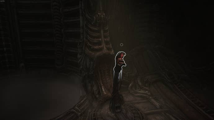The player looks at the level for the elevator in Act 2 of Scorn