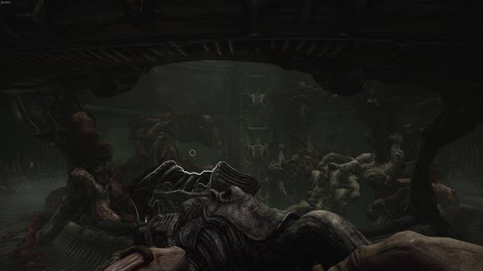 The player is in a small room with a two-handed pillar in Act 3 of Scorn