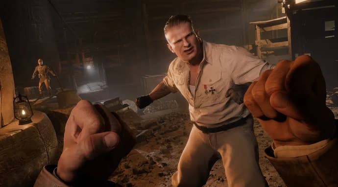 A first person view of Indiana Jones blocking a punch from a towering Nazi
