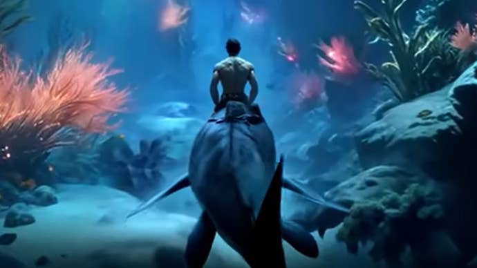 Screenshot from Ark Aquatica trailer showing a human riding on the back of a large aquatic creature underwater