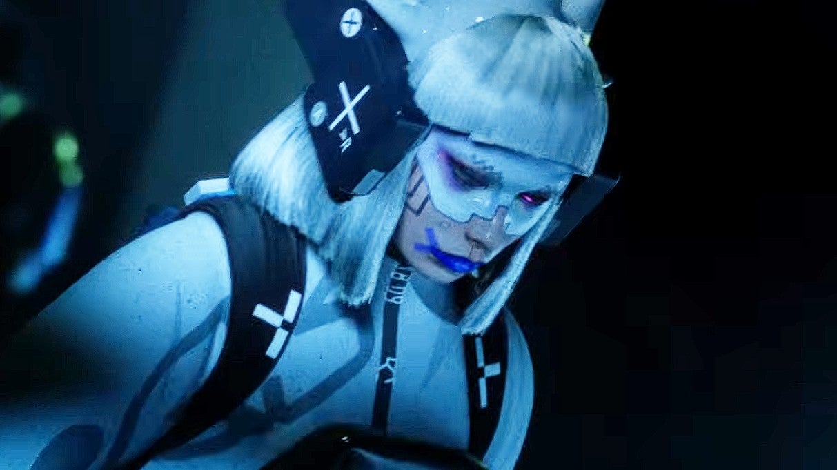 Screenshot from Marathon trailer showing a masked female bathed in a blue light