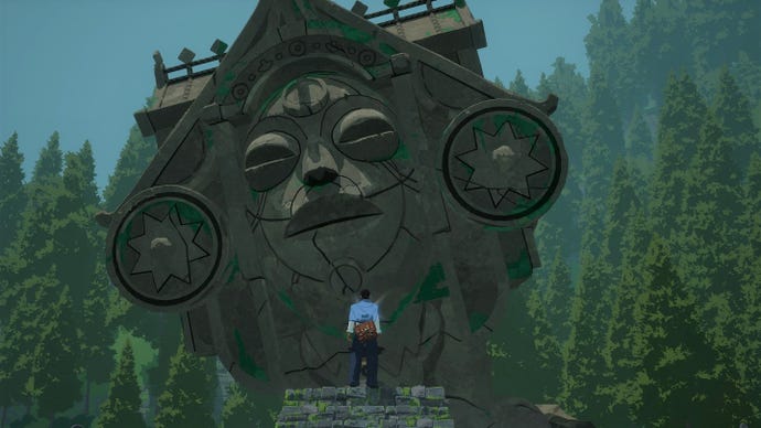 A screenshot from Season showing Estelle standing in front of a huge stone statue of a god’s head