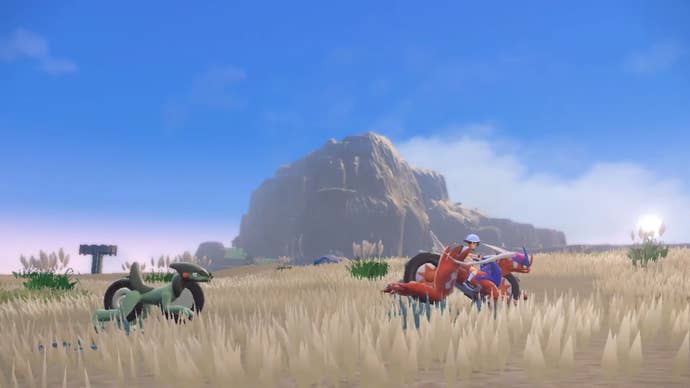 Koraidon and Cyclizar in Pokemon Scarlet and Violet