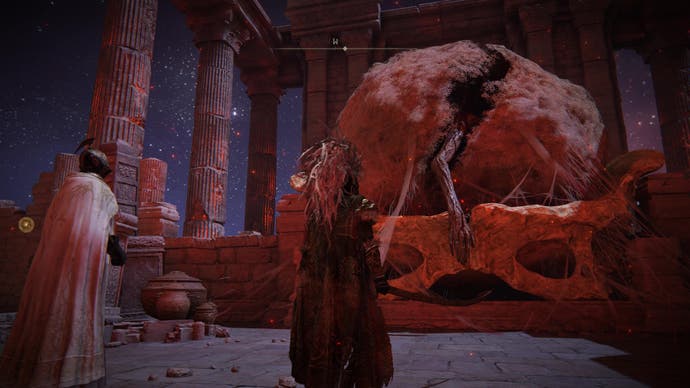 A warrior approaches a giant cocoon with an arm sticking out of it in Elden Ring