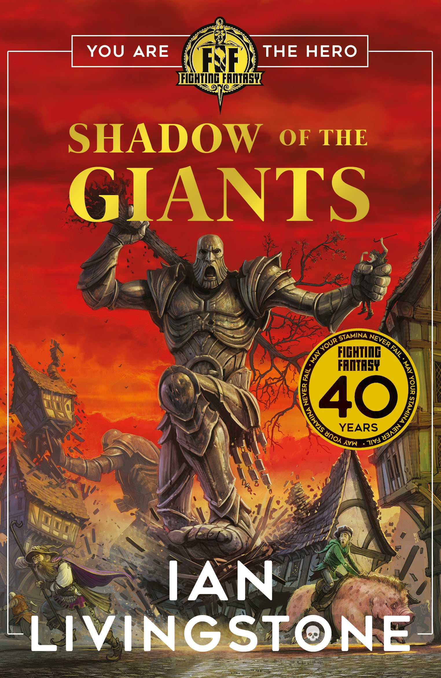Ian Livingstone&rsquo;s new Fighting Fantasy book, Shadow of the Giants. Against a red background, a giant rampages.