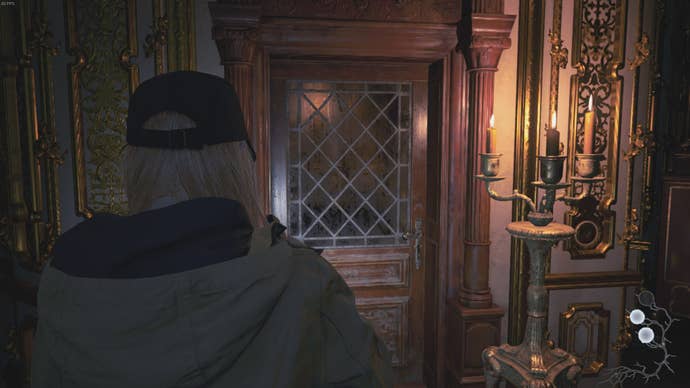 Rose Winters looks at the Hall of Ablution entrance in Resident Evil Village's Shadows of Rose DLC