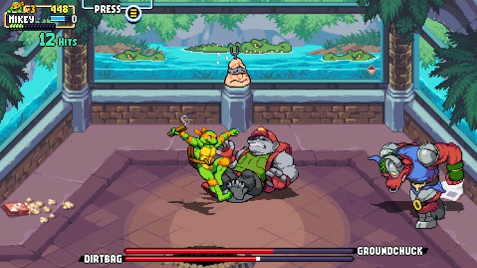 Michelangelo fights Dirtbag and Groundchuck in a red brick gazebo as crocodiles lurk in the waters behind