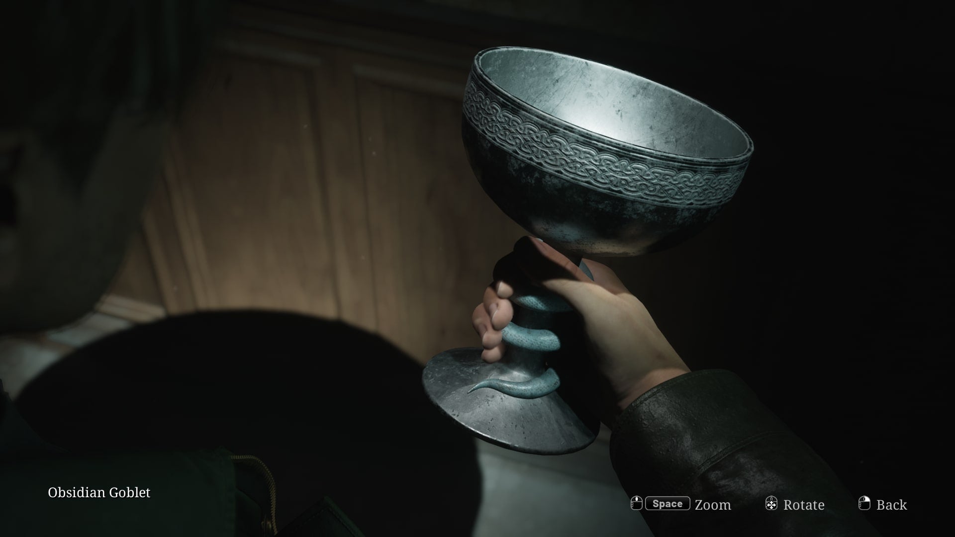 James holds the Obsidian Goblet in the Silent Hill 2 remake