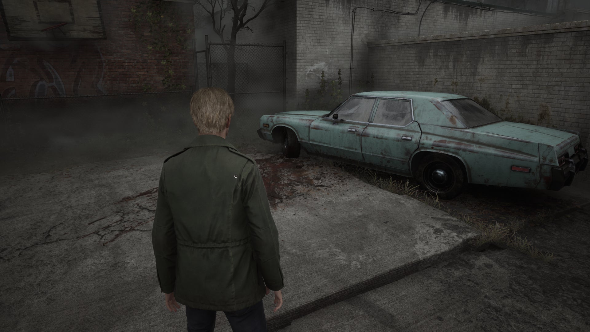 James Sunderland approaches a body by a car that has the Wood Side Apartments Key in the Silent Hill 2 remake - 10