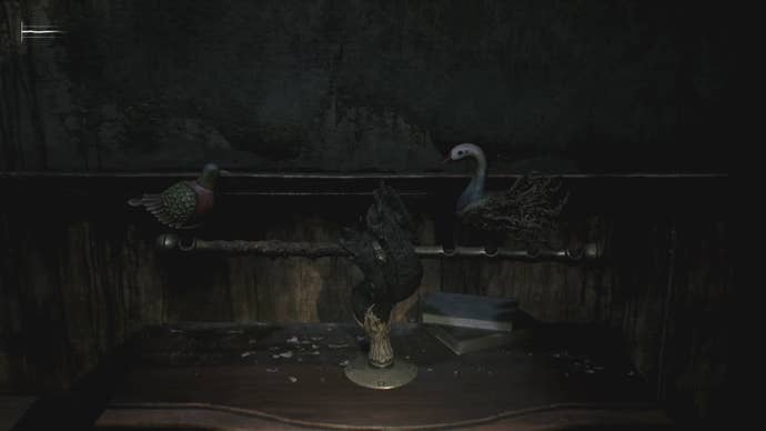 The Pigeon and Swan figurines balancing the Seesaw puzzle in Silent Hill 2.