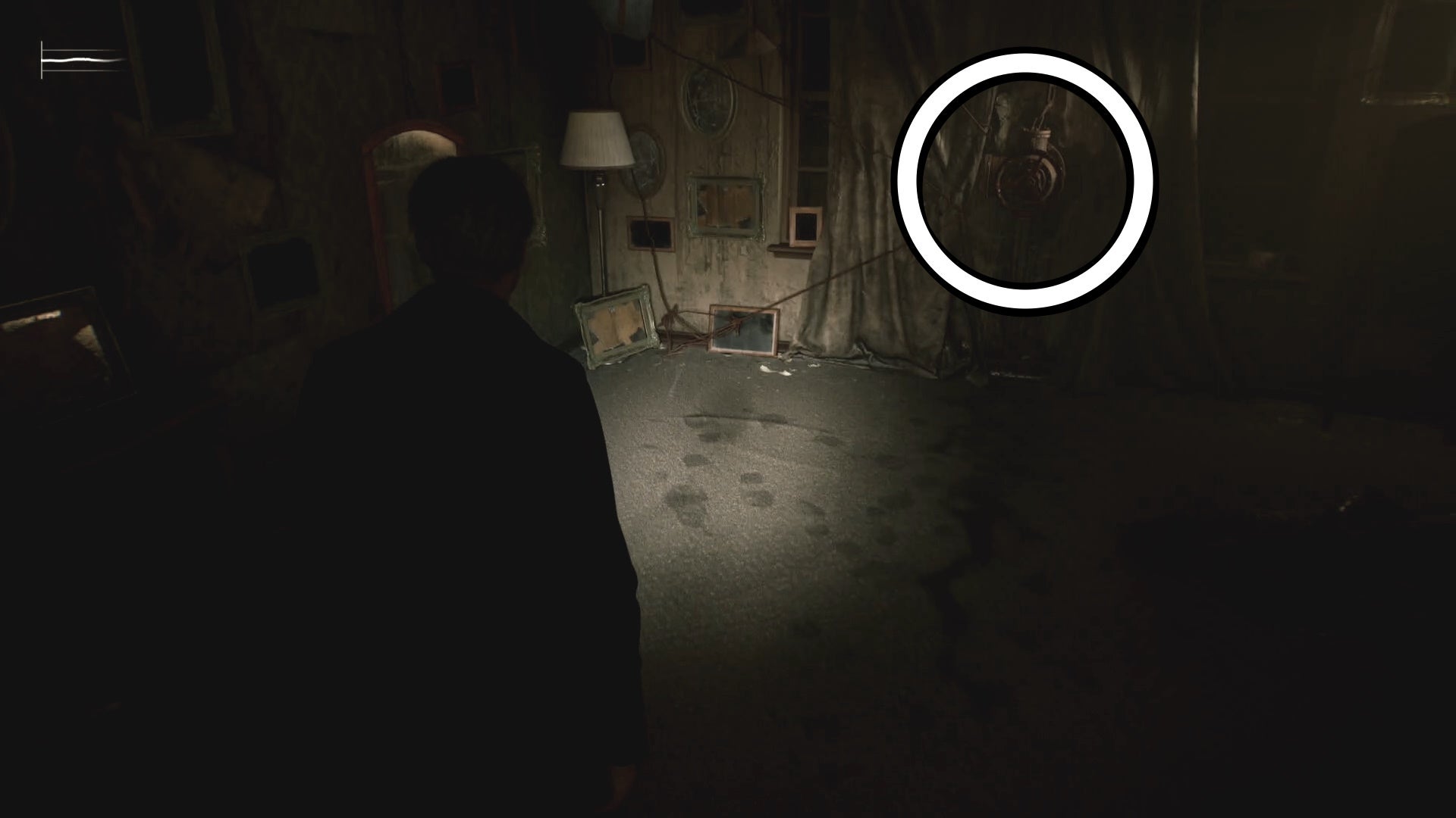 A white circle showing a valve at Blue Creek Apartments in Silent Hill 2.