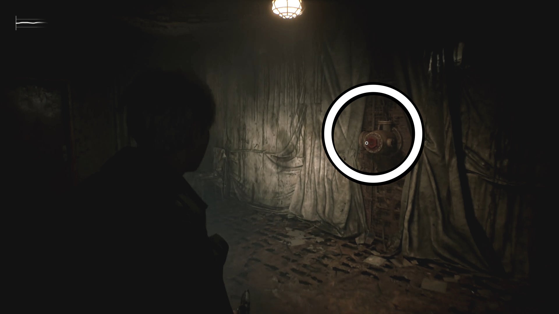 A white corcle showing pipes without a valve in Silent Hill 2.