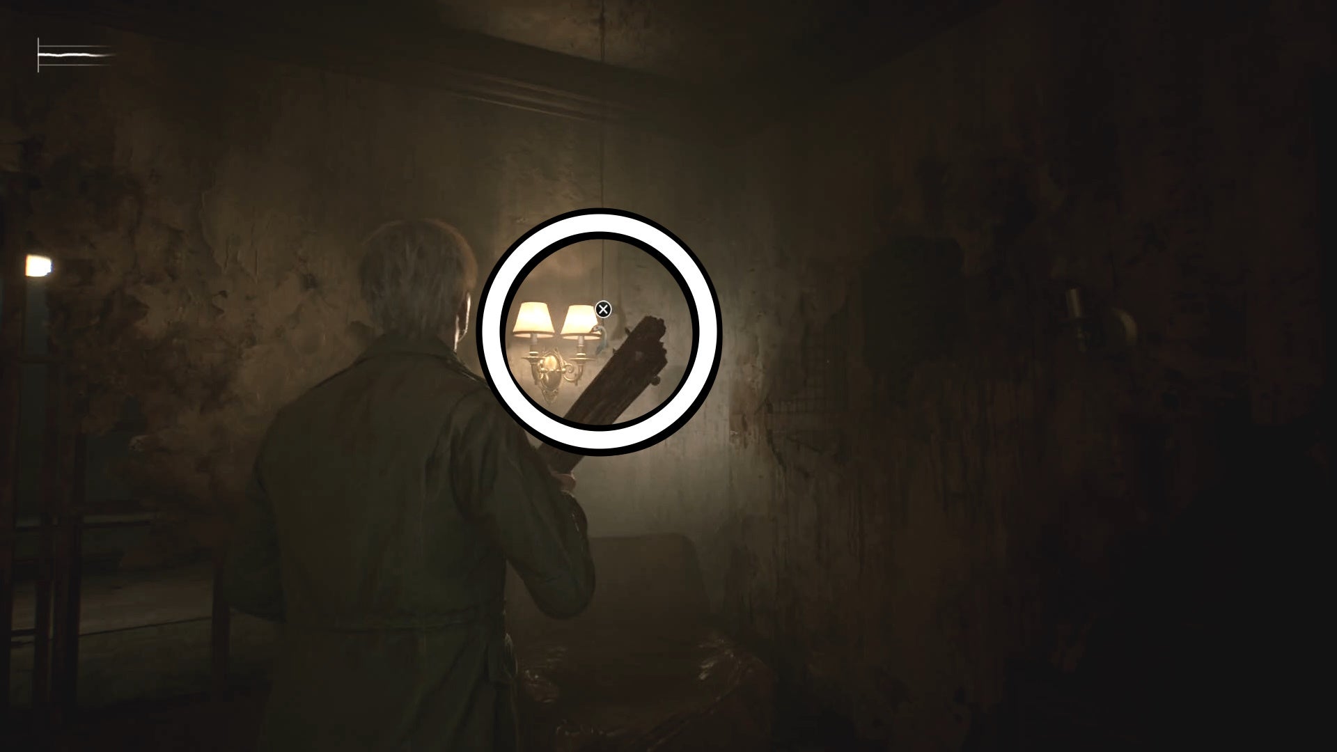 A white circle showing a Swan&rsquo;s Head figurine handing from the ceiling in Silent Hill 2.