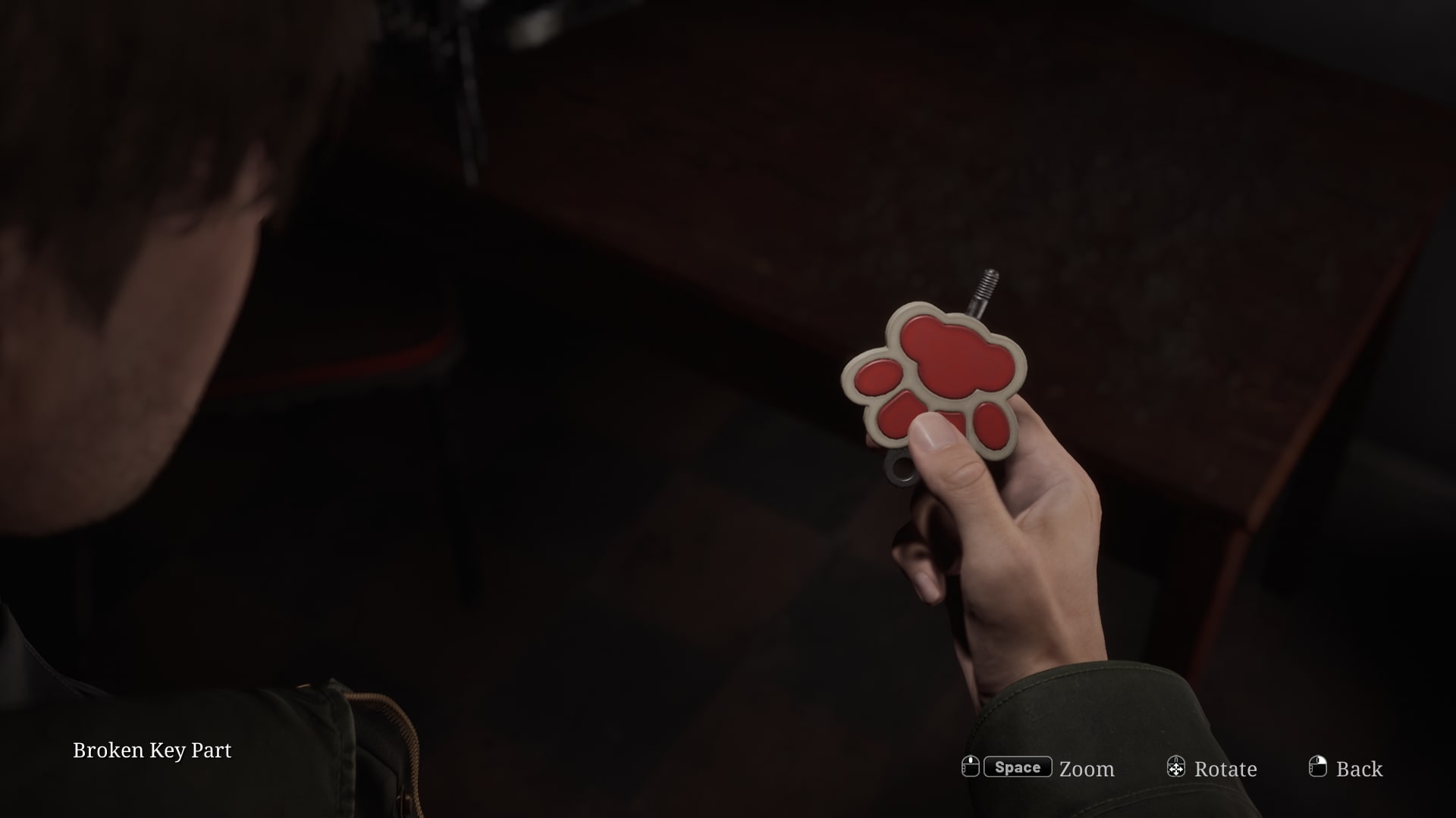 James collects the Broken Key Part 1 from a pet store in the Silent Hill 2 remake - 6
