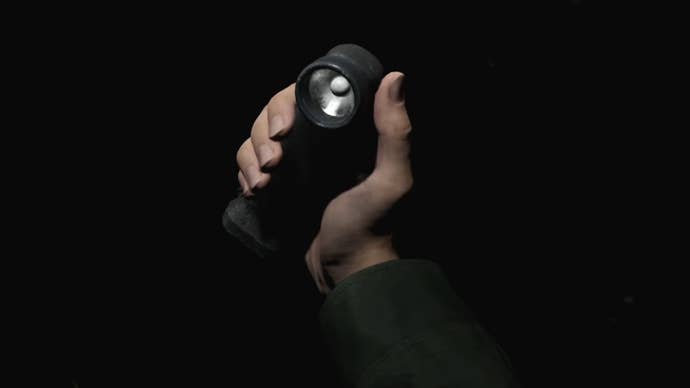 James examining the Flashlight in Silent Hill 2.