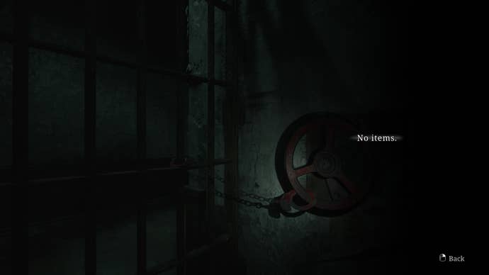 A handcuffed gate found in the Labyrinth that is in need of a key is shown in the Silent Hill 2 remake